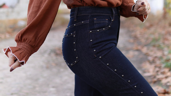 Calças de ganga com tachas