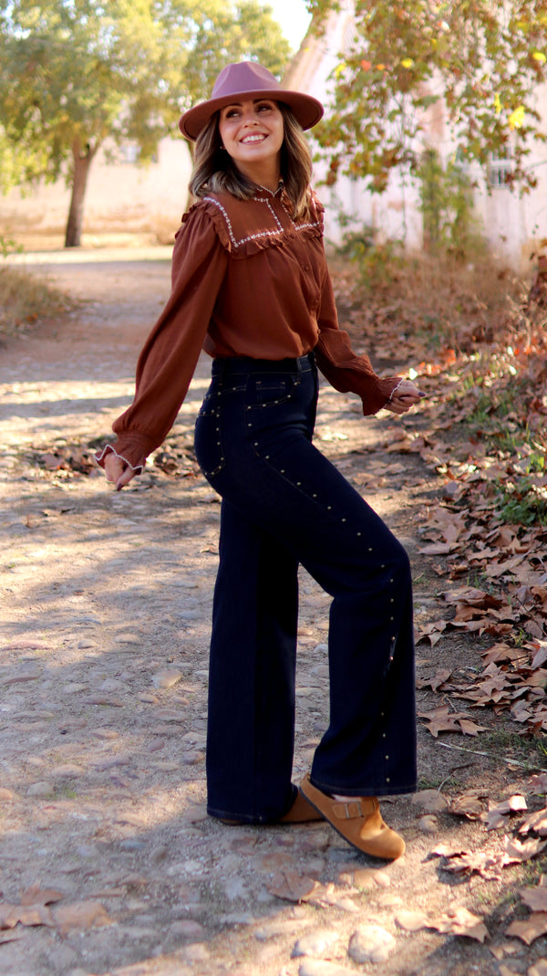 Calças de ganga com tachas